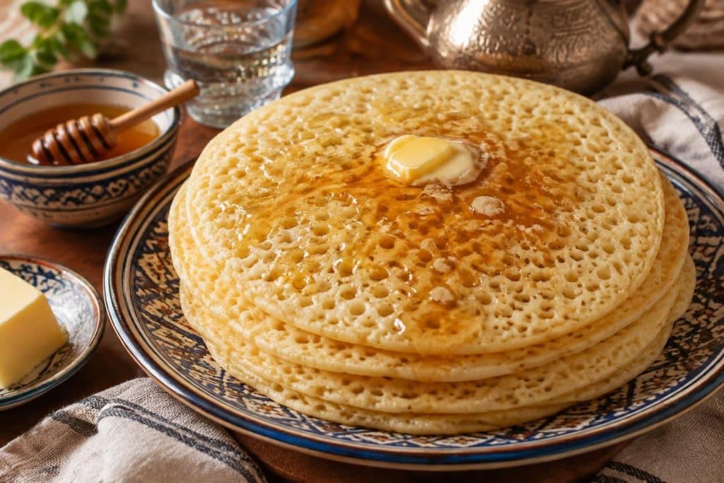 découvrez nos recettes faciles et rapides de baghrir marocain, les célèbres crêpes mille trous, légères et moelleuses, à savourer au petit-déjeuner.